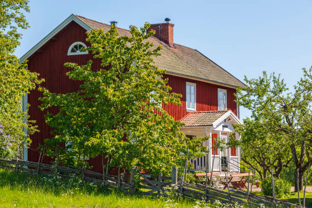red old country house with garden - sweden nobody building exterior architectural feature imagens e fotografias de stock