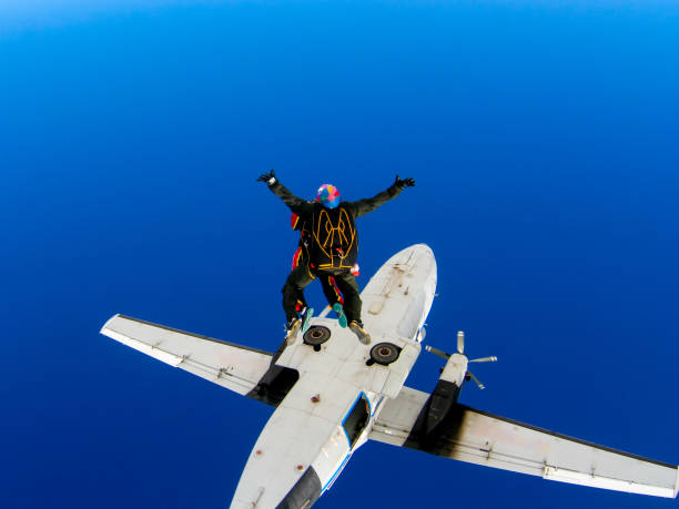 istock Parachute jump from an airplane in tandem with an instructor. 1158455925