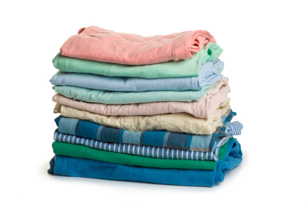 istock stack of clothing isolated on white background 1158456337