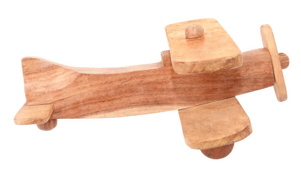 istock Wooden vintage plane toy isolated on white background 1158458664