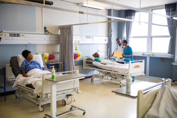 istock Female patient looking away while lying on bed 1158459788