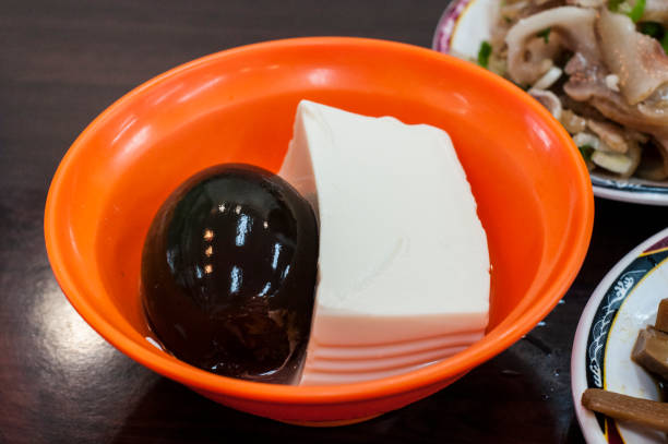 istock -Century egg and tofu in a plastic bowl 1158459831