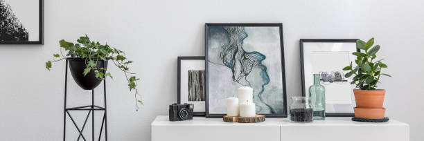 istock White sideboard and flower stand 1158461423