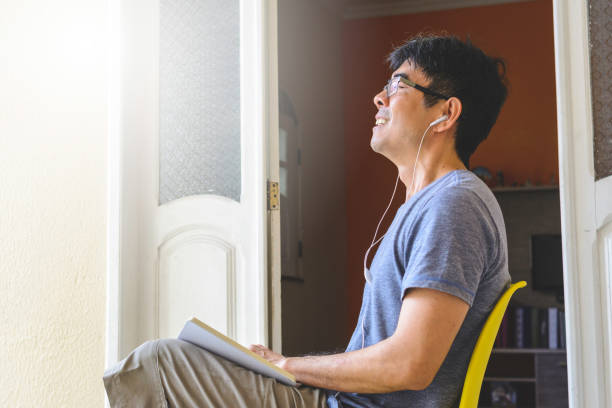 istock Asian man meditating and writing gratitude journal 1158464981