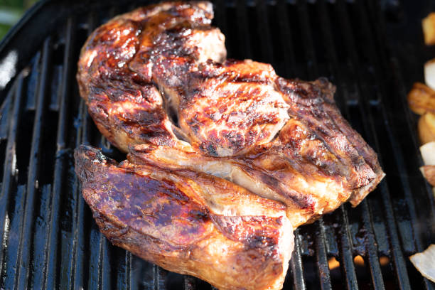 istock beef cooking on an outdoor grill 1158465074