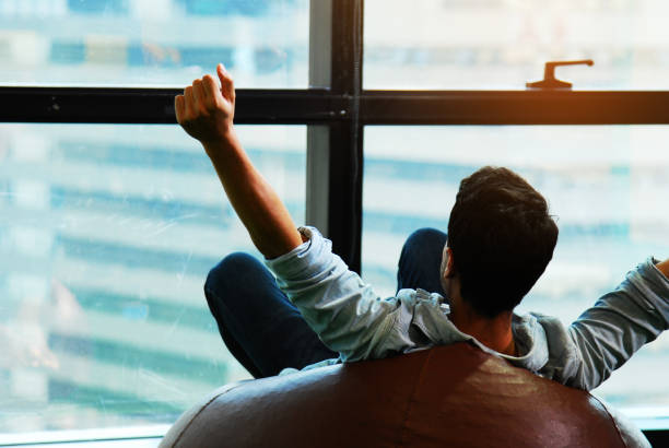 istock Creative man relaxation and happy for work job success in office. 1158465360