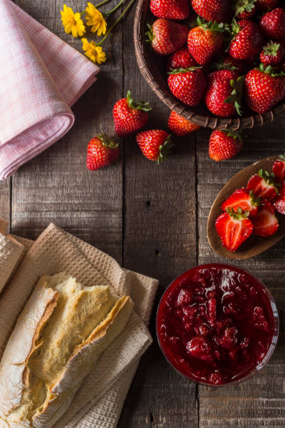 istock Strawberries, marmalade and bread. 1158466315