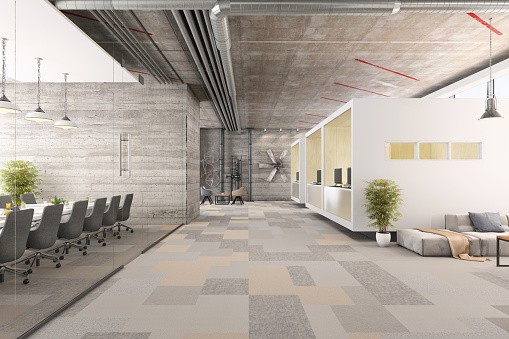 Light business interior with armchairs and pc computer on desk, side view, beige concrete floor. Coworking loft with panoramic window on tropics. 3D rendering