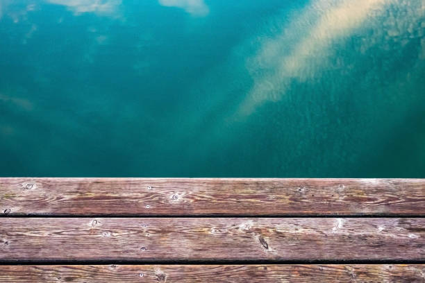 Early morning on Bernard Lake. Small boat dock reaching out into the water.