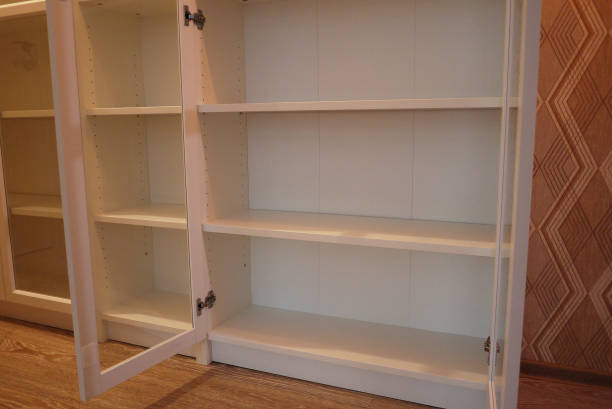 istock Bookcase with bookshelves. 1158475059
