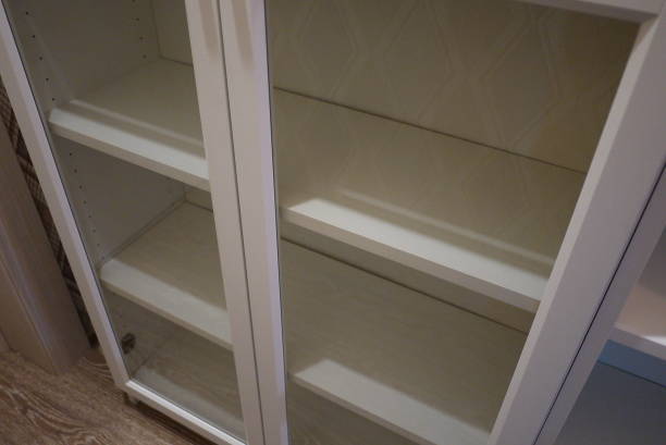 istock Bookcase with bookshelves. 1158475070