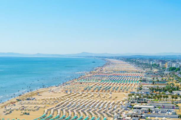 Aerial view of Rimini beach in Italy Aerial view of Rimini resort beach in Italy with a lot of parasols and sunbeds during summer time rimini stock pictures, royalty-free photos & images