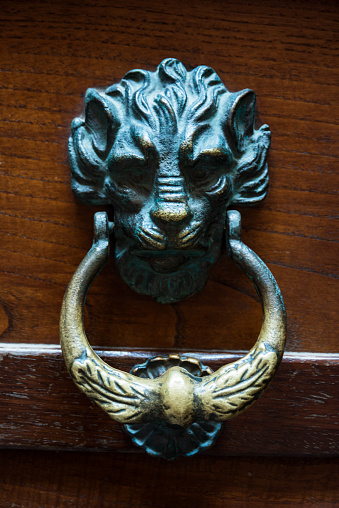 Old elegant metal door handle