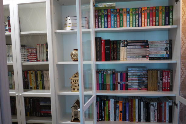 istock Bookcase with bookshelves. 1158479154