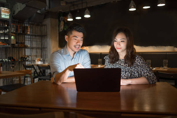 istock Insurance broker with small restaurant business owner 1158479499