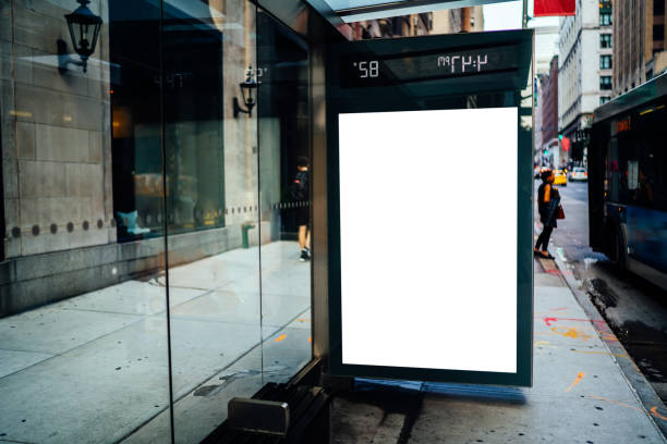 istock Bus station billboard with blank copy space screen for advertising text message or promotional content, empty mock up Lightbox for information, stop shelter clear poster display in urban city street 1158479656