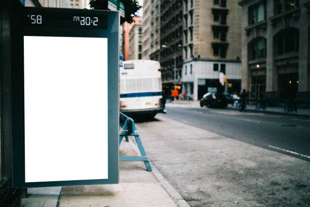 istock Bus station billboard with blank copy space screen for advertising text message or promotional content, empty mock up Lightbox for information, stop shelter clear poster display in urban city street 1158480175