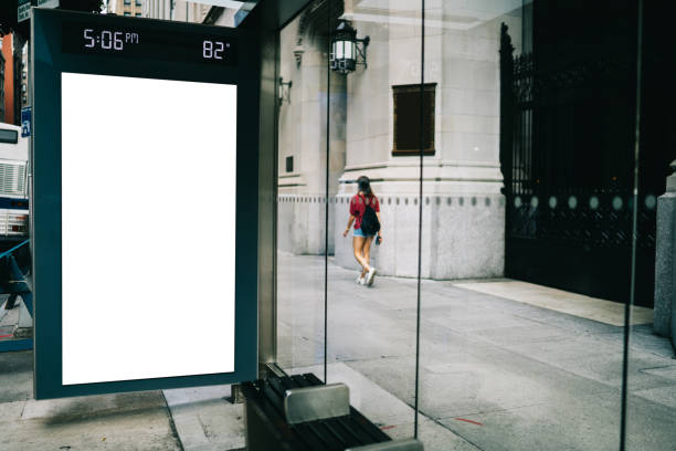 istock Bus station billboard with blank copy space screen for advertising text message or promotional content, empty mock up Lightbox for information, stop shelter clear poster display in urban city street 1158480180