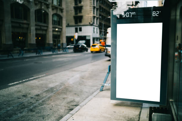 istock Bus station billboard with blank copy space screen for advertising text message or promotional content, empty mock up Lightbox for information, stop shelter clear poster display in urban city street 1158480183
