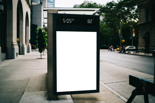 istock Bus station billboard with blank copy space screen for advertising text message or promotional content, empty mock up Lightbox for information, stop shelter clear poster display in urban city street 1158480293