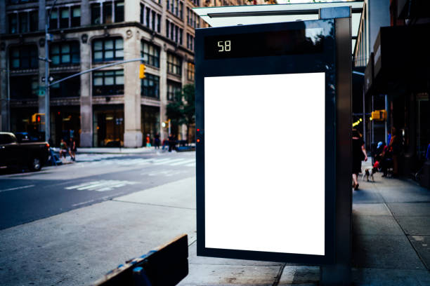 istock Bus station billboard with blank copy space screen for advertising text message or promotional content, empty mock up Lightbox for information, stop shelter clear poster display in urban city street 1158480294