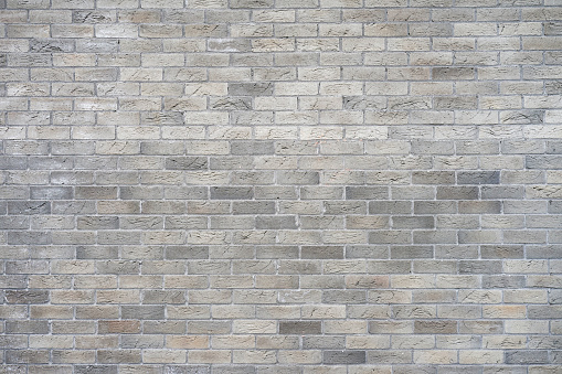 Old gray brick wall texture background