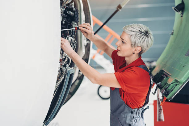 istock Female technician repairing an airplane 1158484921