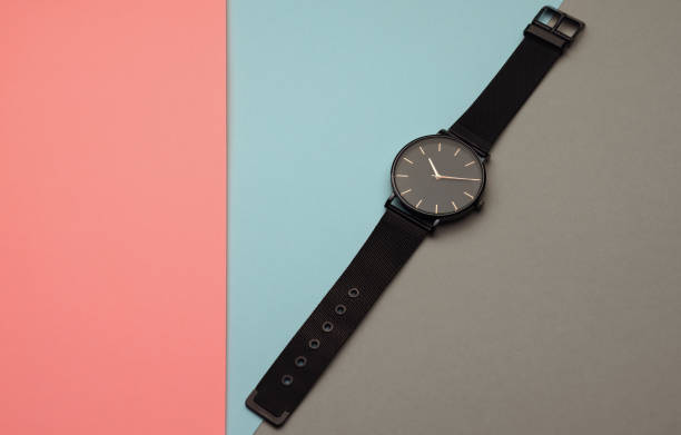 istock Wrist watch on pastel color paper background 1158485697