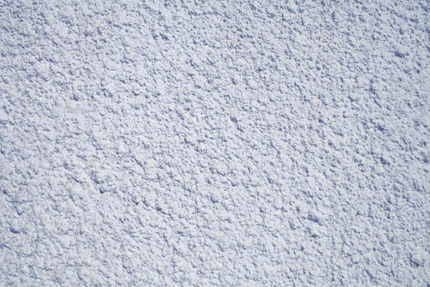 istock Textured finishing of concrete wall as a background with space for your insertion 1158485769