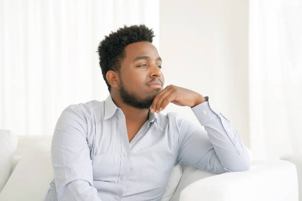 istock The man dreams on the sofa. 1158485868