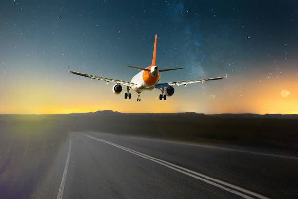istock Airplane flying over roadway 1158490722