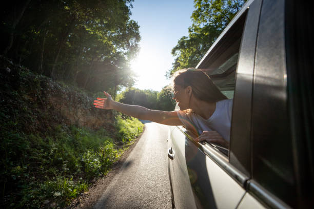 istock Girl having fun on the road trip 1158493201
