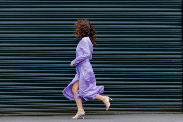 istock Happy woman outdoors 1158495421