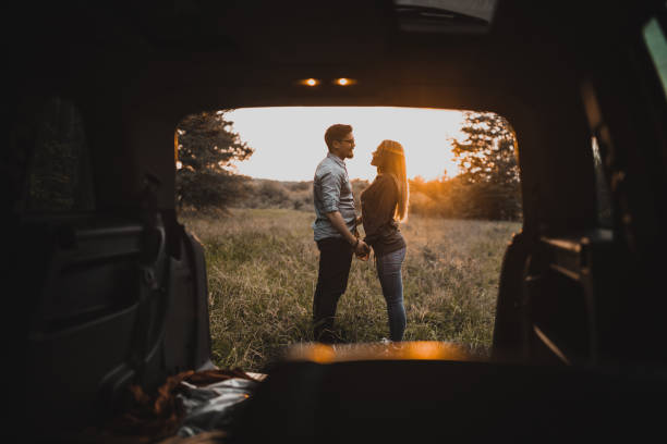 istock Couple camping at their car 1158498365
