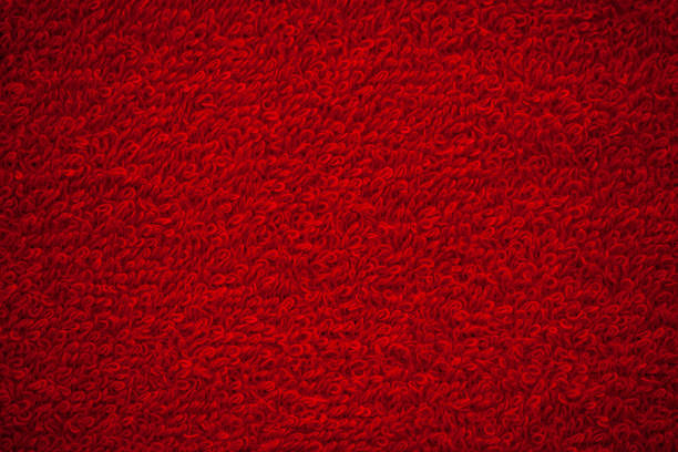 istock Red terry natural cotton towel background texture 1158498416