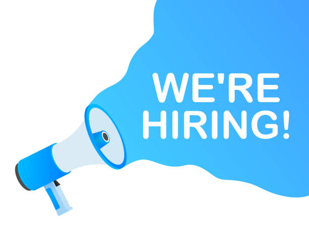 istock We're Hiring web banner. Megaphone With We are Hiring Speech on green background. Vector stock illustration. 1158498621