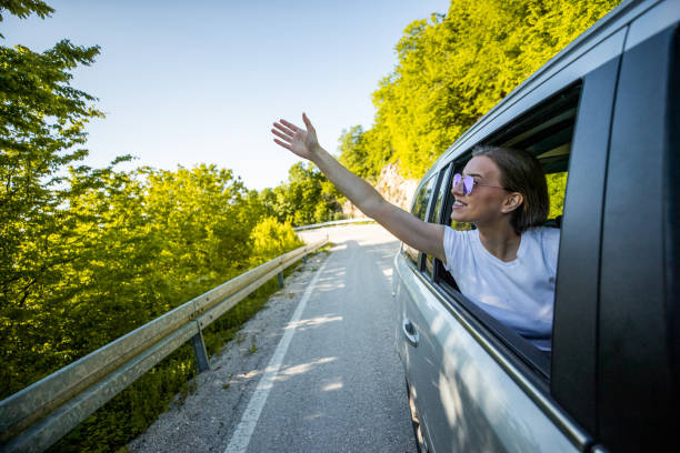 istock Girl having fun on the road trip 1158499728