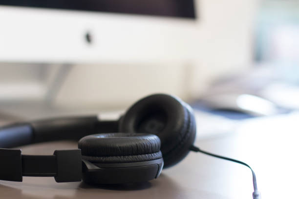 istock Headphones on a desk 1158501634