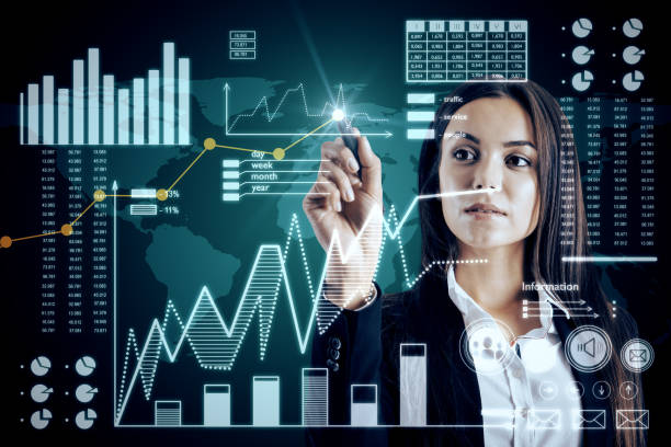 istock Beautiful young businesswoman with business interface 1158502539