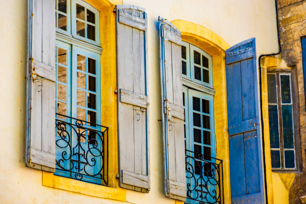 Windows with blue shutters in Avignon (Provence-Alpes-Côte d'Azur, France). stock photo