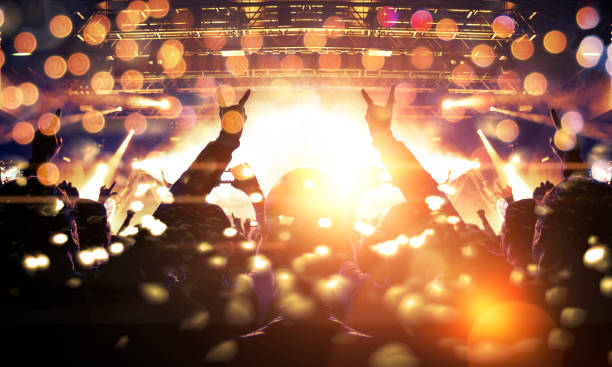 istock Concert crowd in front of a live stage 1158503495