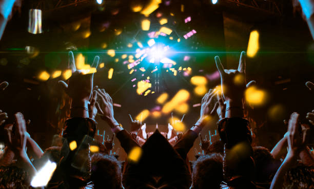 istock Concert crowd in front of a live stage 1158503496