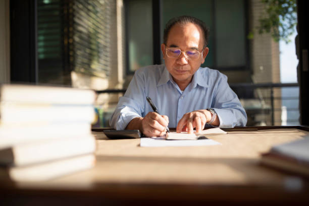 istock Senior man managing his personal finances 1158507877