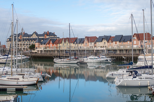 Dives-Sur-Mer, France - January 3, 2019: the harbour, boats, and buildings at dives-sur-mer