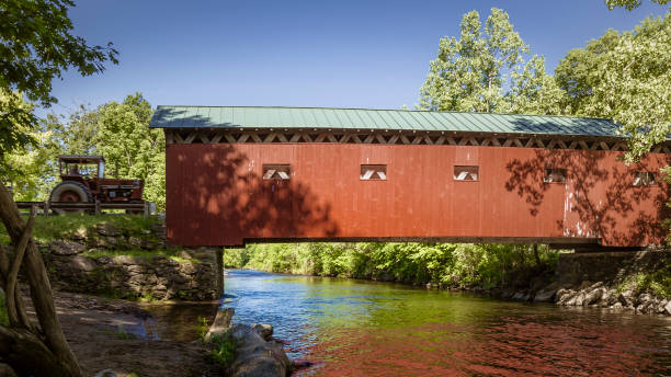 istock Tractor and Vermont Covered Bridge 1158511337