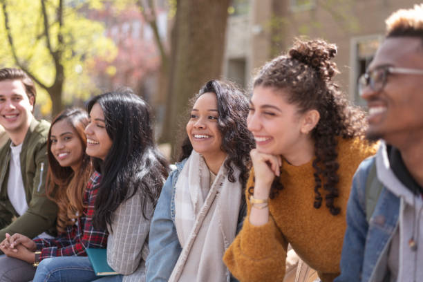 istock Multi-Ethnic Group of University Students Hanging Outside Campus 1158514129