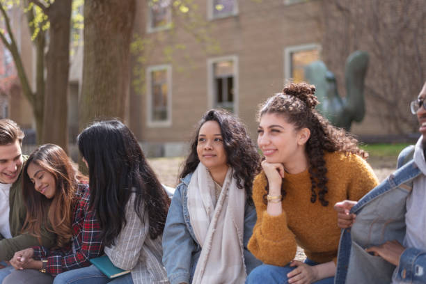 istock Multi-Ethnic Group of University Students Hanging Outside Campus 1158514130