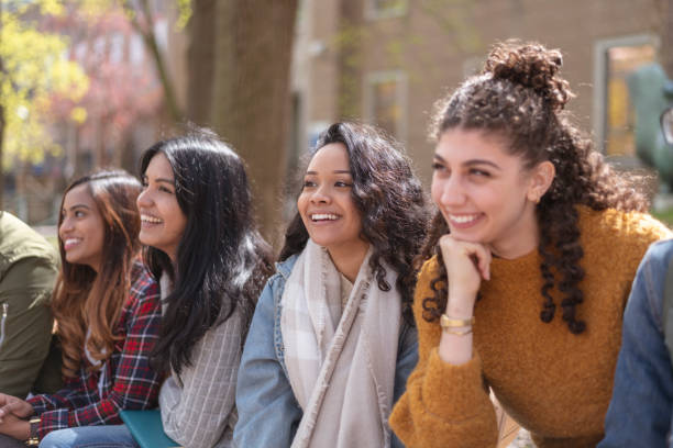 istock Multi-Ethnic Group of University Students Hanging Outside Campus 1158514131