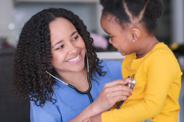 istock Female pediatrician with patient 1158514532