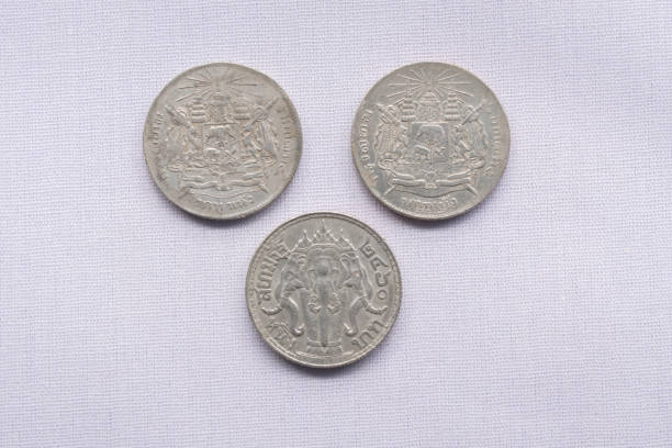 istock Thai currency coins have been used a hundred years ago. 1158517430
